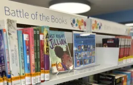A display of books in a library assembled for a contest called Battle of the Books for grade school readers.